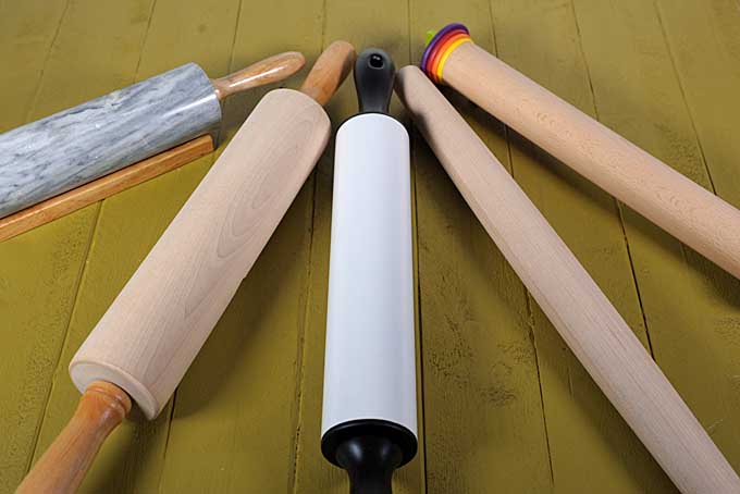 5 different kinds of rolling pins on greed wooden table top | Foodal