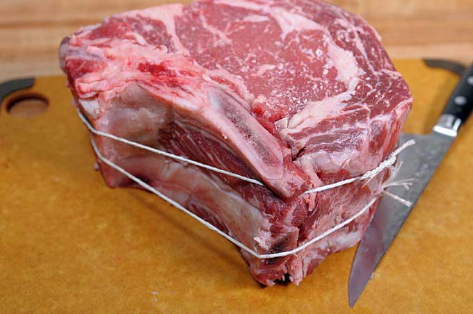 Butcher's twine used to reattached rib bones to a prime rib roast | Foodal