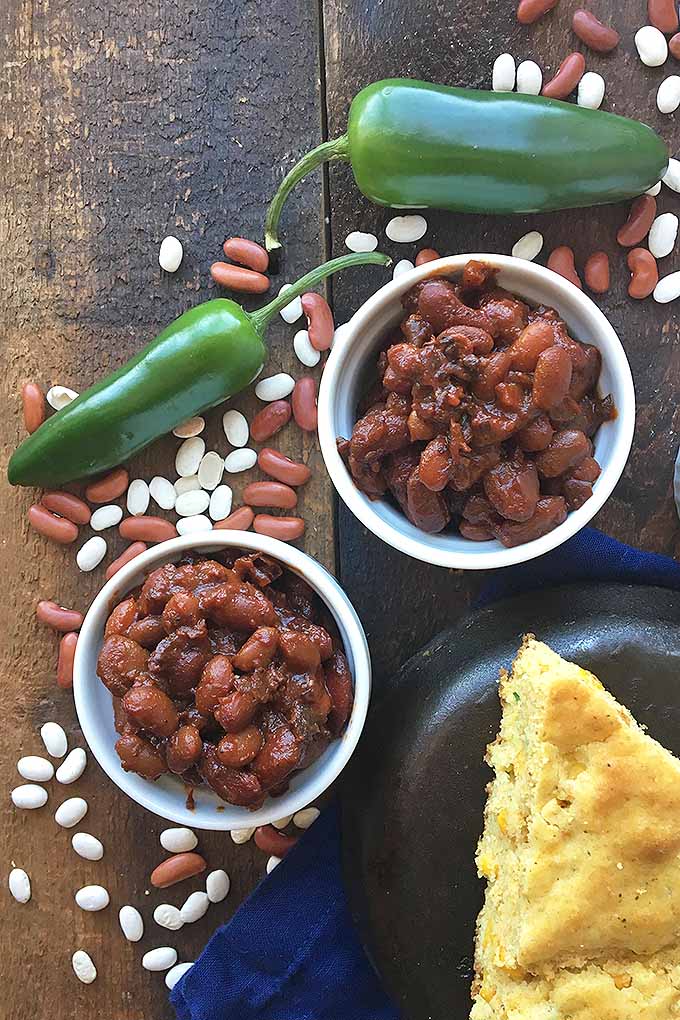 Learn how to make rich, hearty, and flavorful baked beans, using your slow cooker and dried beans. We share this low and slow recipe: https://foodal.com/recipes/grains-and-legumes/slow-cooker-baked-beans/
