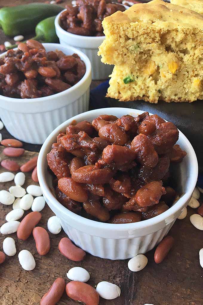 Learn how to make baked beans... in the slow cooker! We share our recipe: https://foodal.com/recipes/grains-and-legumes/slow-cooker-baked-beans/