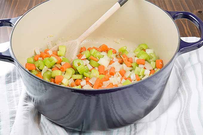 Sauteeing mirepoix for chicken noodle soup. | Foodal.com