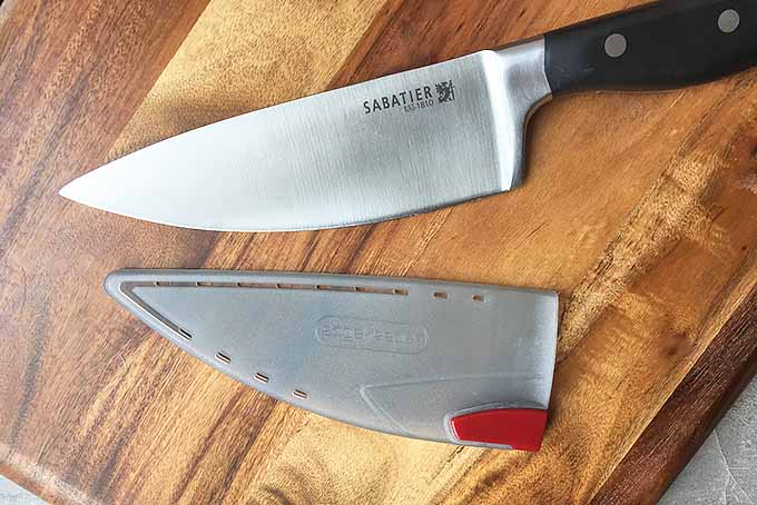 A knife with a self-sharpening sheath | Foodal.com