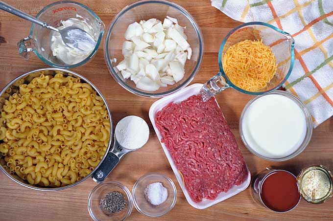 All of the ingredients required for the Cheesy Hamburger Skillet in on place.