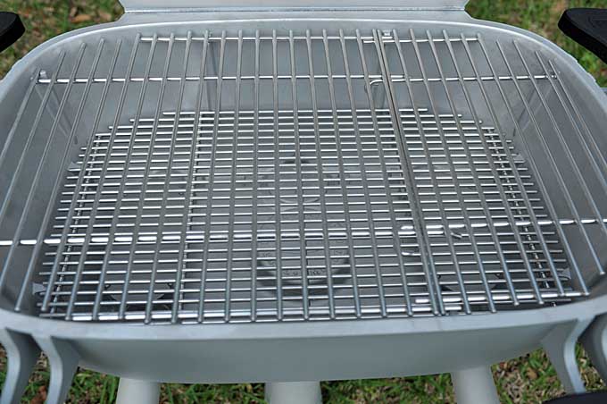 Close up of the two piece stainless cooking grill.
