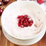 Horizontal image of a bowl of cherry cream cheese.