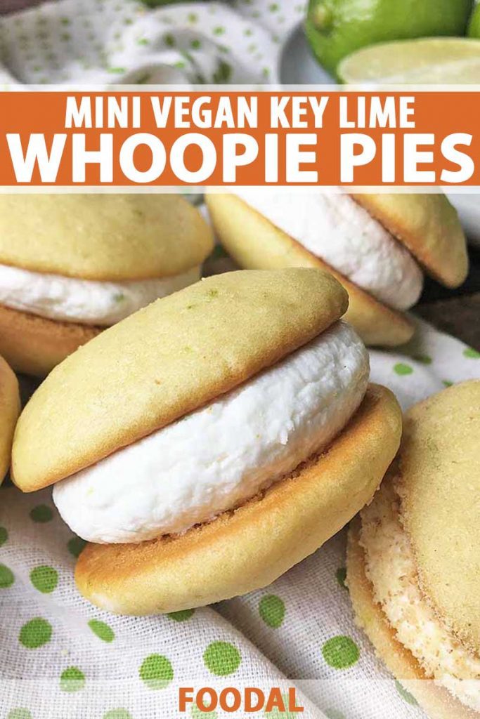 Vertical image of a pile of whoopie pies on a towel with green dots.