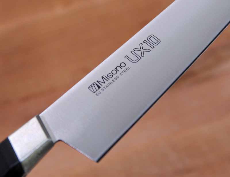 Close up of a laser printed Misono UX10 logo on the blade.