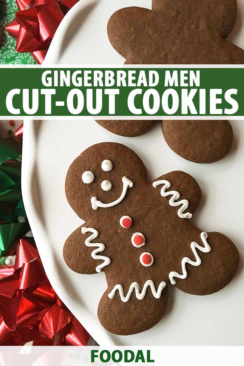 Vertical image of two gingerbread men cut-outs, one decorated, on a white plate next to ribbons with white text on a green background.