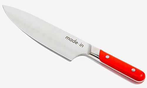 Image of a Made In cutlery item with a red handle.