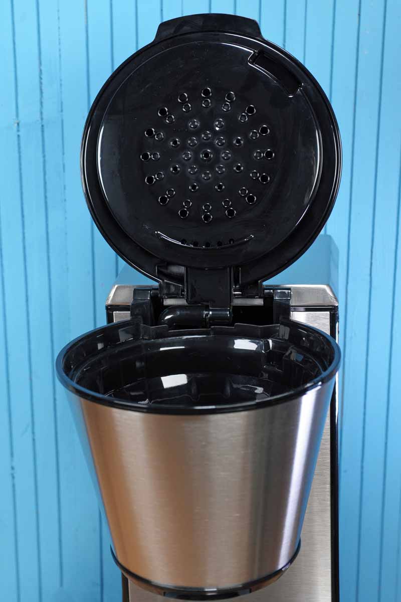 The lid of the Cuisinart CPO-850 Pour Over Coffee Brewer opened, showing the shower-head dispersion mechanism.