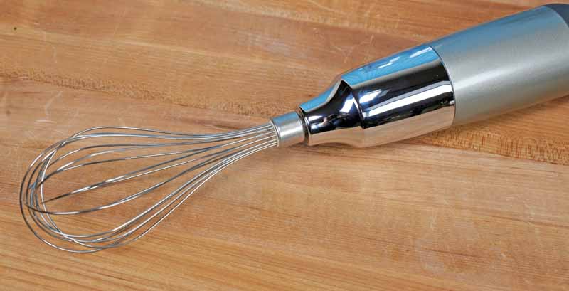KitchenAid 2561 Whisk Attachment on a maple wooden table top.