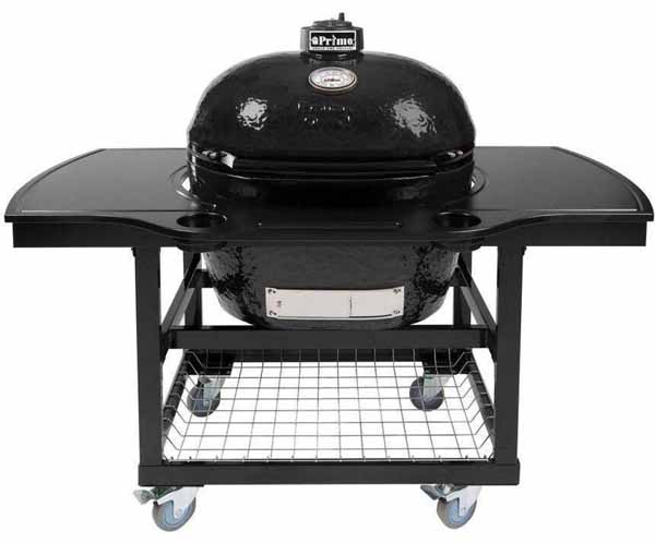 Primo Oval XL Ceramic Kamado Grill On Steel Cart With 1-Piece Island Side Shelves and Cup Holders on a white, isolated background.
