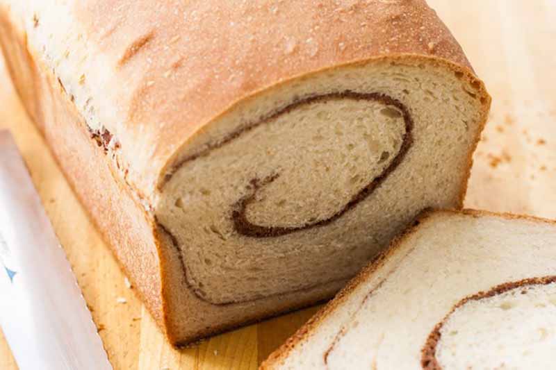 Horizontal close-up image of a loaf with a swirl.