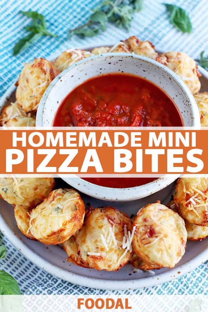 Vertical image of savory pizza-flavored muffins arranged in a ring on a plate with a small bowl of marinara sauce at the center, on a blue and white checkered fabric background with scattered sprigs of basil, printed with orange and white text.