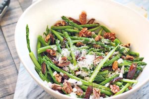 Warm Asparagus Salad with Dates, Roasted Walnuts, and Pecorino Cheese