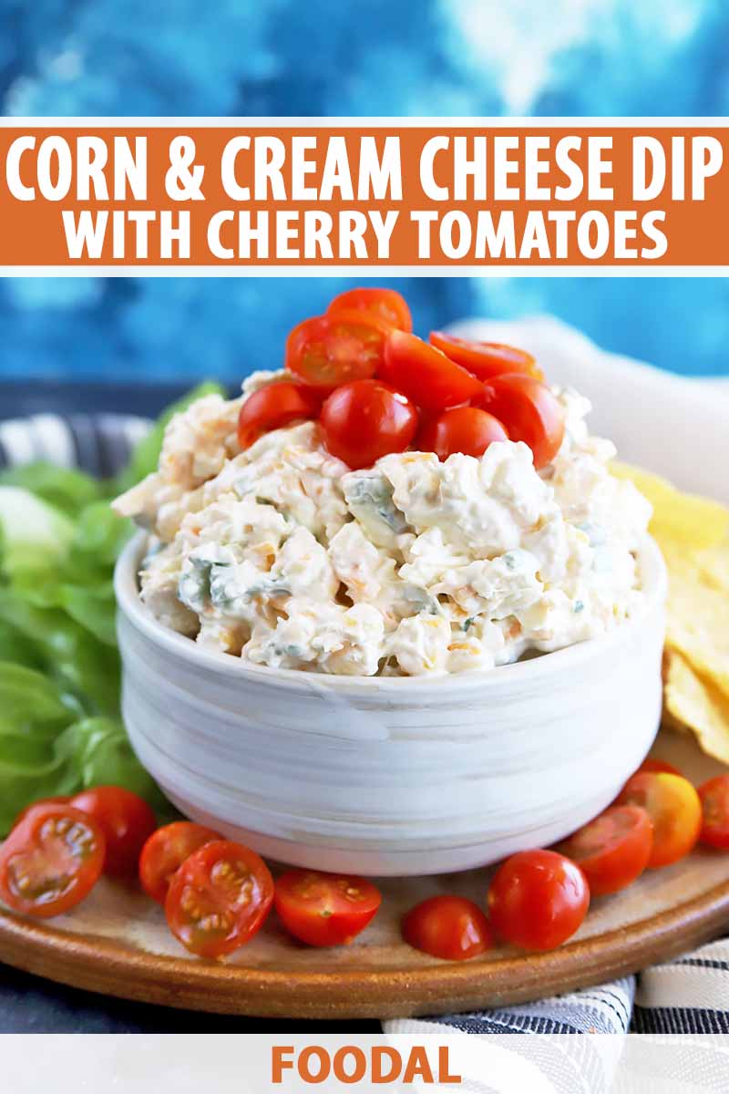 Vertical image of a white bowl with a light yellow creamy appetizer topped with sliced cherry tomatoes, with text on the top and bottom of the image.