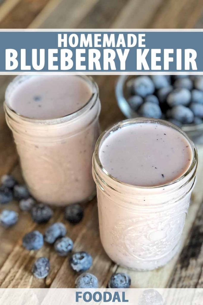 Vertical image of two glasses filled with a light purple smoothie, with blueberries next to them and text on the top and bottom of the image.