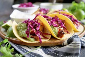 Salmon Tacos with Tomatillo Guacamole and Red Cabbage Slaw
