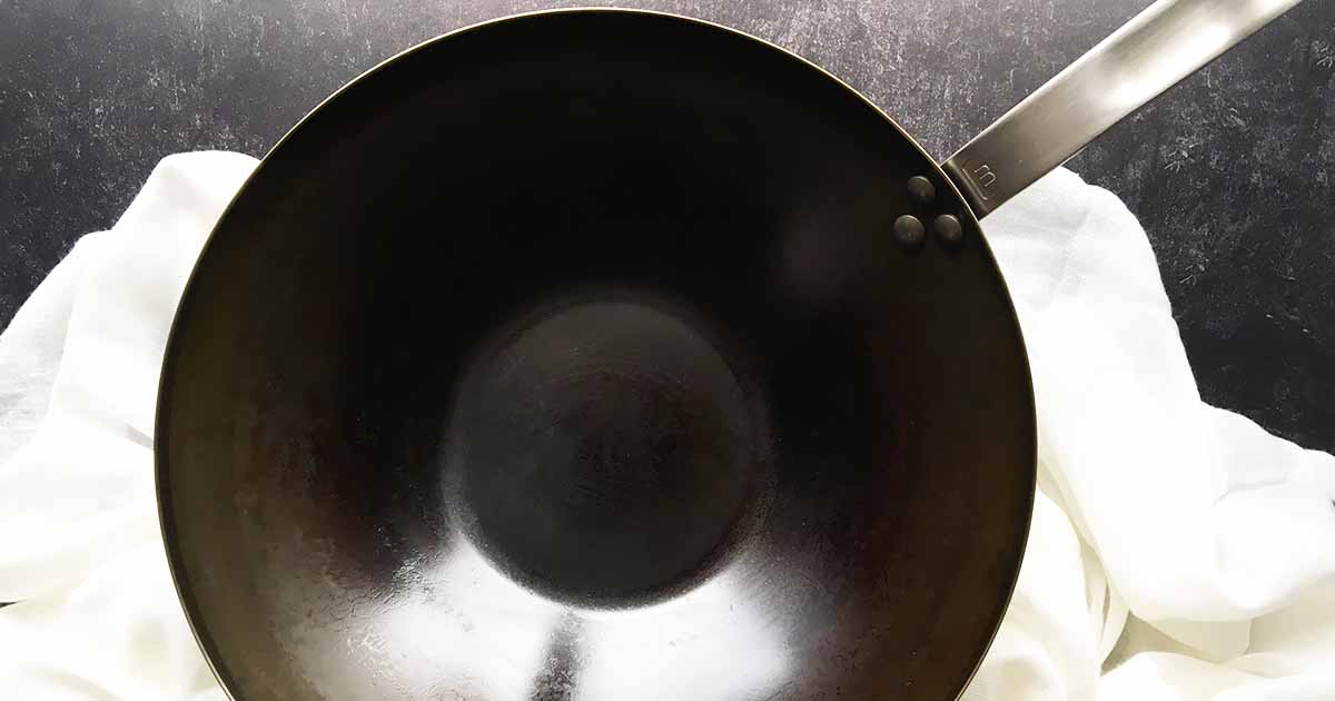 best oil to season carbon steel wok