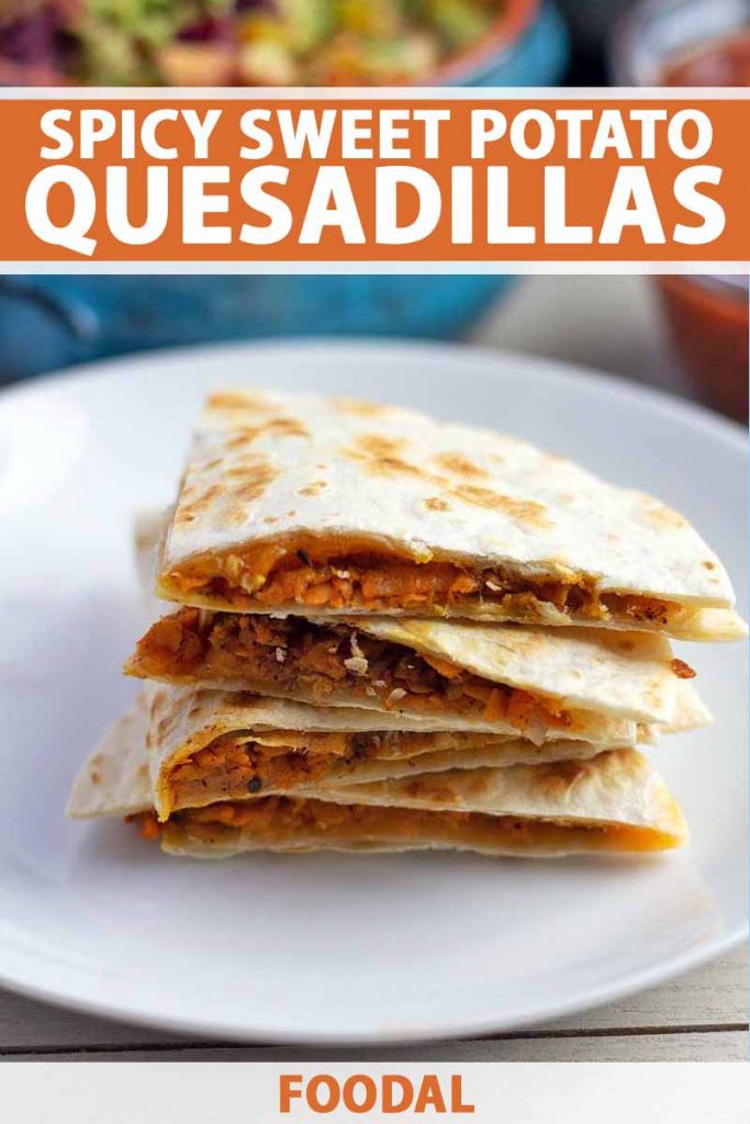 Vertical image of four quarters of a homemade sweet potato quesadilla that have been stacked on top of each other on a white ceramic plate, with a blue ceramic bowl of guacamole and a glass bowl of salsa in soft focus on the background, printed with orange and white text near the top and at the bottom of the frame.