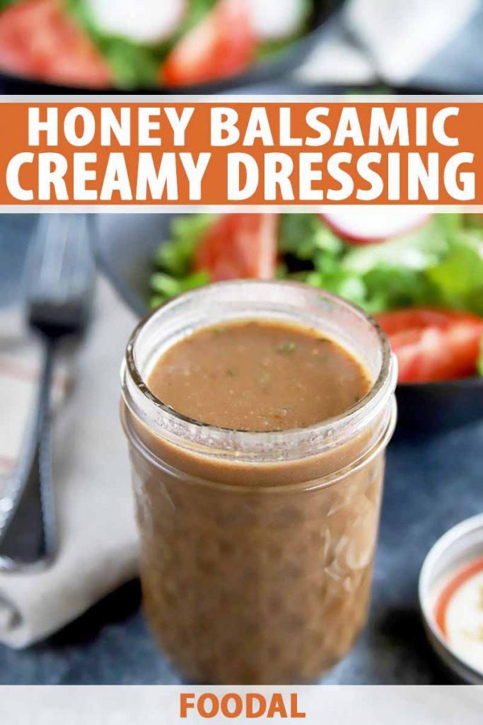 Vertical image of a glass jar filled with a brown dressing in front of a fork, napkin, and salad in bowls, with text on the top and bottom of the image.