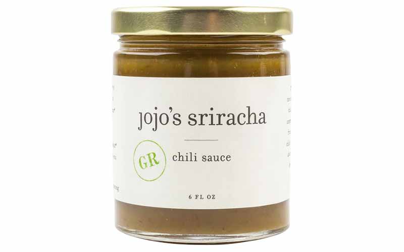 Horizontal image of Jojo's Green Chili Sriracha Sauce.