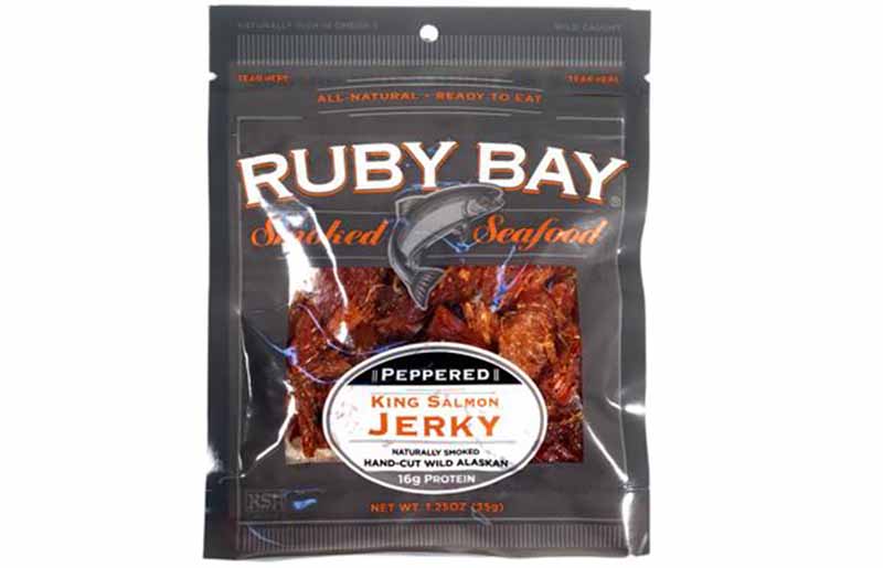 Image of a gray bag of Ruby Bay's peppered king salmon jerky.
