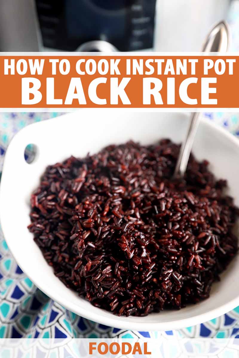 Vertical image of a white bowl filled with cooked black rice with a spoon inserted in it, with text on the top and bottom of the image.