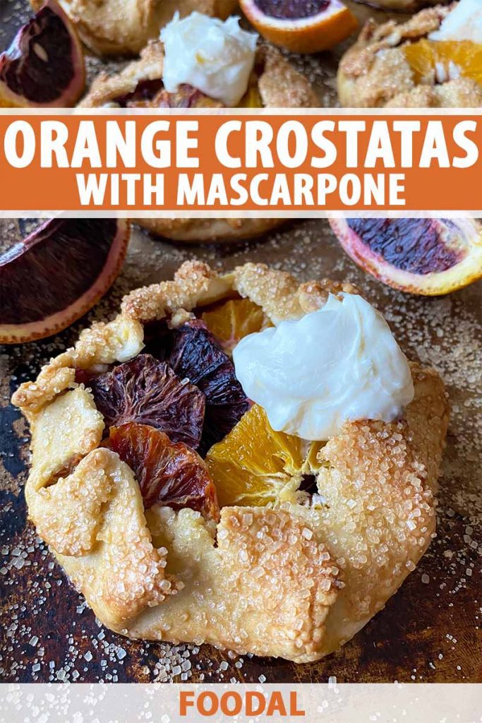 Vertical image of an orange crostata with a dollop of mascarpone on a baking sheet sprinkled with sugar, with text on the top and bottom of the image.