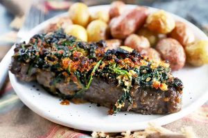 Flavor-Packed Mediterranean Steaks with Spinach, Feta, and Sun-Dried Tomato Pesto