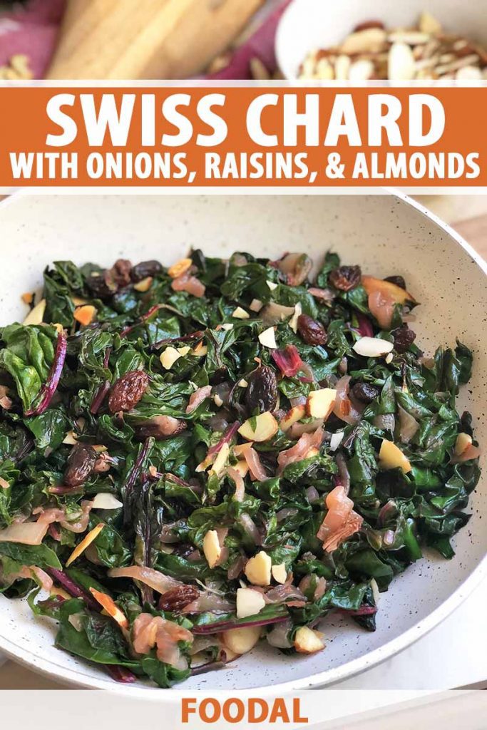 Vertical image of a white pan filled with sauteed greens and nuts, with text on the top and bottom of the image.