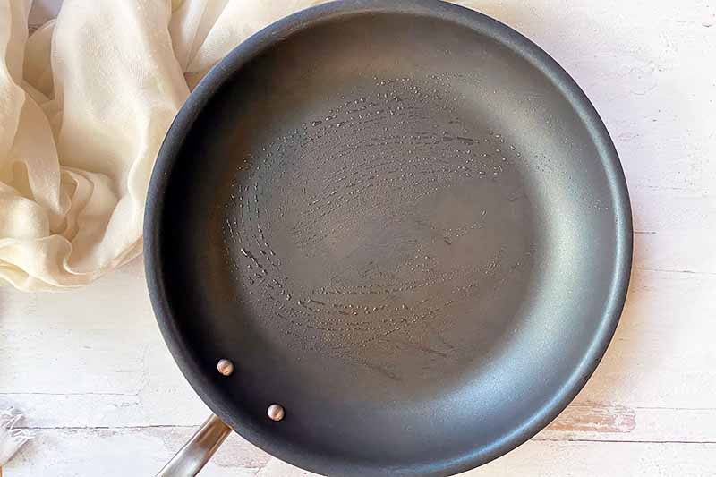 Horizontal image of a greased skillet.
