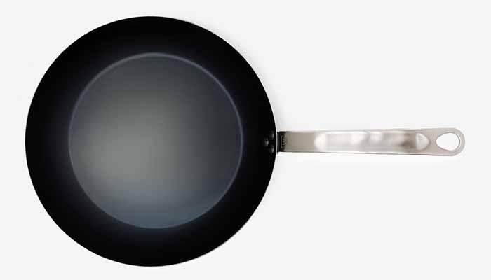 Image of a Blue Carbon Steel Frying Skillet with Metal Handle.