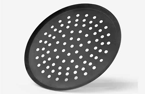 Image of a perforated pizza peel.