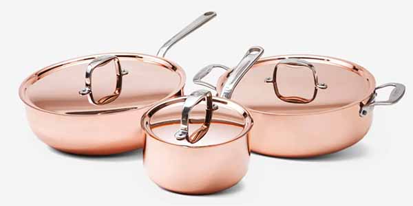 Image of three pieces with lids in a copper cookware set.