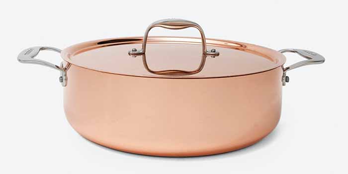 Image of a copper rondeau with stainless steel handles