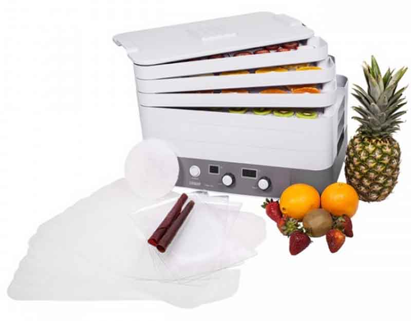 Image of a multi-layered dehydrator next to its components and whole fresh fruits.