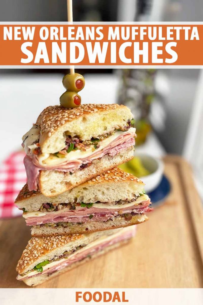 Vertical image of a stacked sandwich on a wooden table next to a checkered towel, with text on the the top and bottom of the image.