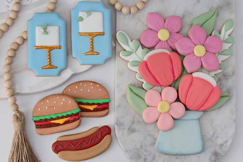 Horizontal image of assorted celebratory cookies.