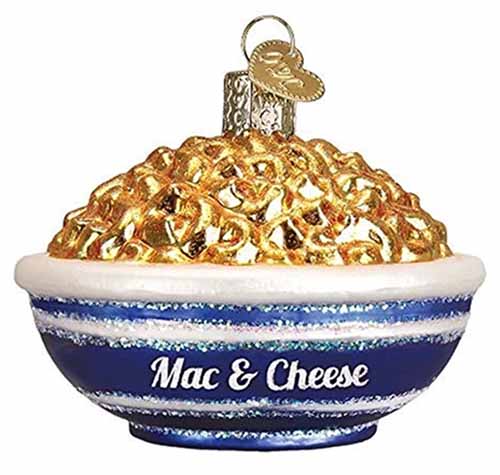 Image of a mac and cheese ornament with sparkle detailing.