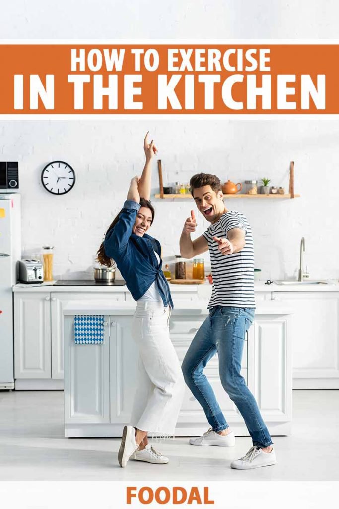 Vertical image of a man and woman dancing in a kitchen with white decor, with text on the top and bottom of the image.
