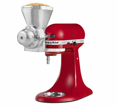 Image of the KitchenAid KGM attachment on a red KitchenAid mixer.