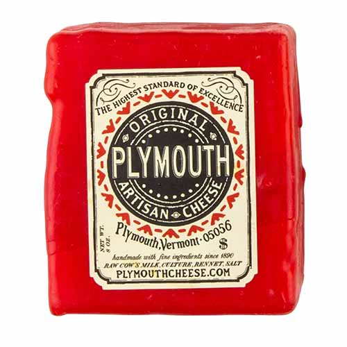 Image of Plymouth's Original Cheddar in a red wax.