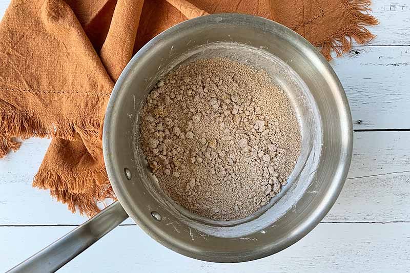 Horizontal image of a brown sugar dry mix in a pot.