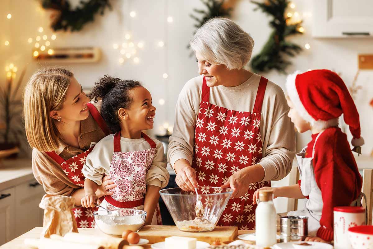 Horizontal image of a family baking together during the Christmas season.