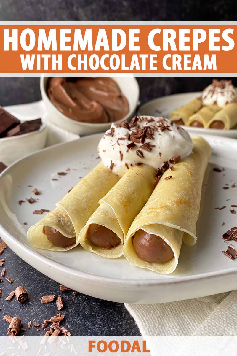Vertical image of three crepes with a chocolate pudding filling on a white plate, with text on the top and bottom of the image.