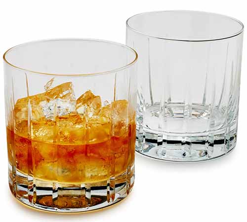 Image of Schott Zwiesel Kirkwall Double Old-Fashioned Rocks Glasses, one filled.