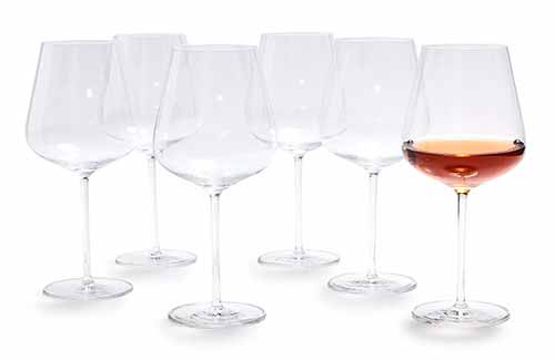 Image of the collection of Schott Zwiesel Vervino All-Purpose Wine Glasses, with one filled.